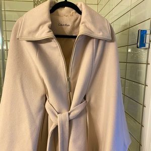 Cream colored cape jacket with belt ..